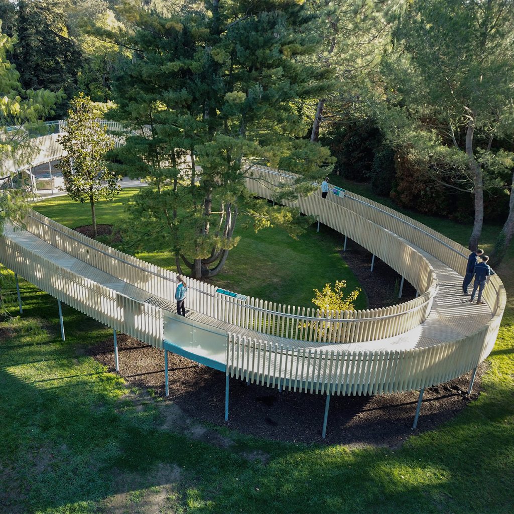 Aerial view from above at the Cambridge botanic gardens. The rising path is made from accoya wood and goes around in a full circle.