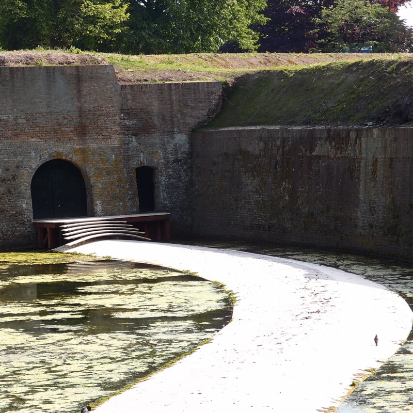 Floating bridge in the Netherlands, leading to a fort. 