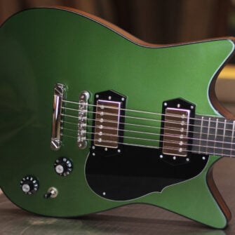 Frank-Brothers-Signature-Accoya-Guitar-On-side.-hero-image