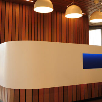Accoya desk angled - wide