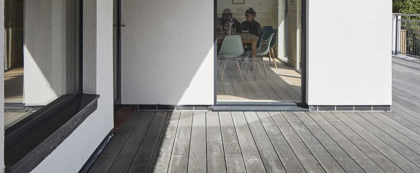 Accoya Color Gray Decking with people indoors - square