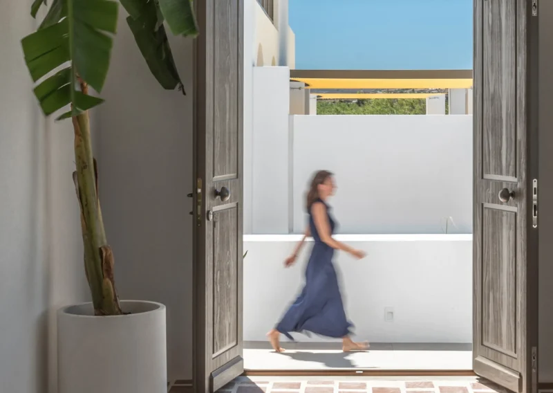 Wooden doors opening to hotel