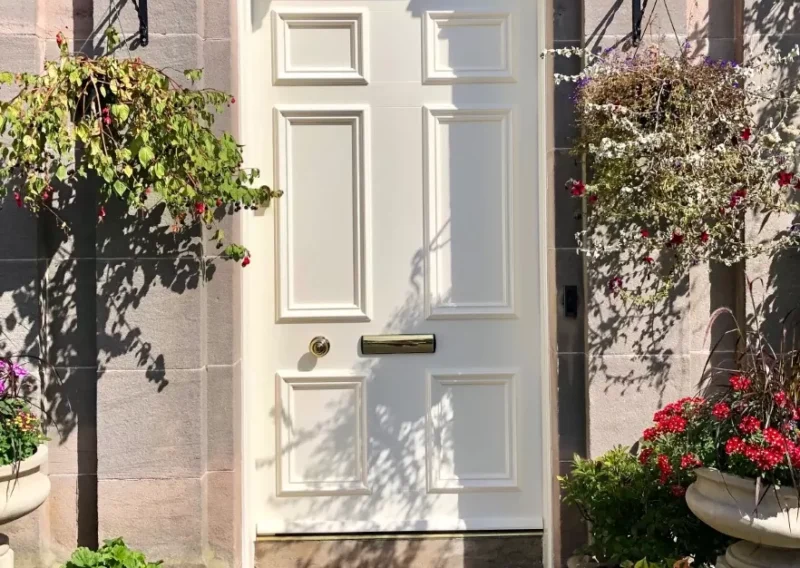 white wooden front door