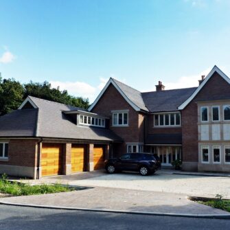Hardwick casement windows square lead glass elevation painted strutt yellow reclaimed brick building