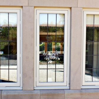 Hardwick casement windows stone mullions square lead glass painted strutt yellow